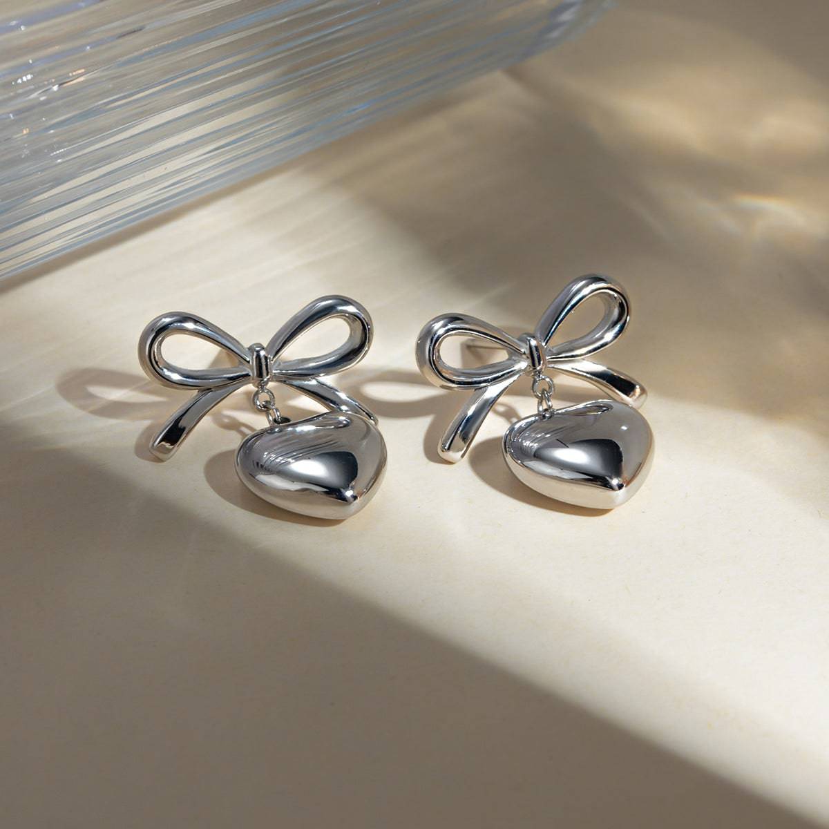 Stainless Steel Bow & Heart Drop Earrings - Carri's Cache