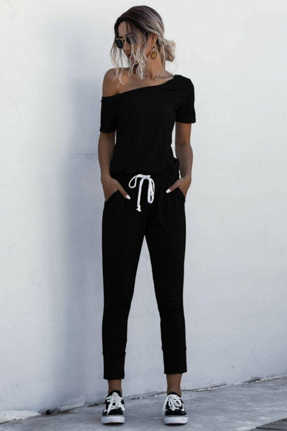 Asymmetrical Neck Tied Jumpsuit with Pockets.