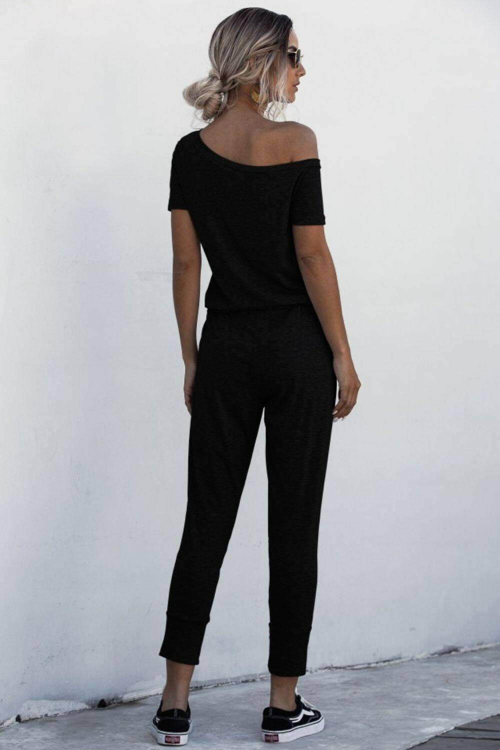 Asymmetrical Neck Tied Jumpsuit with Pockets.