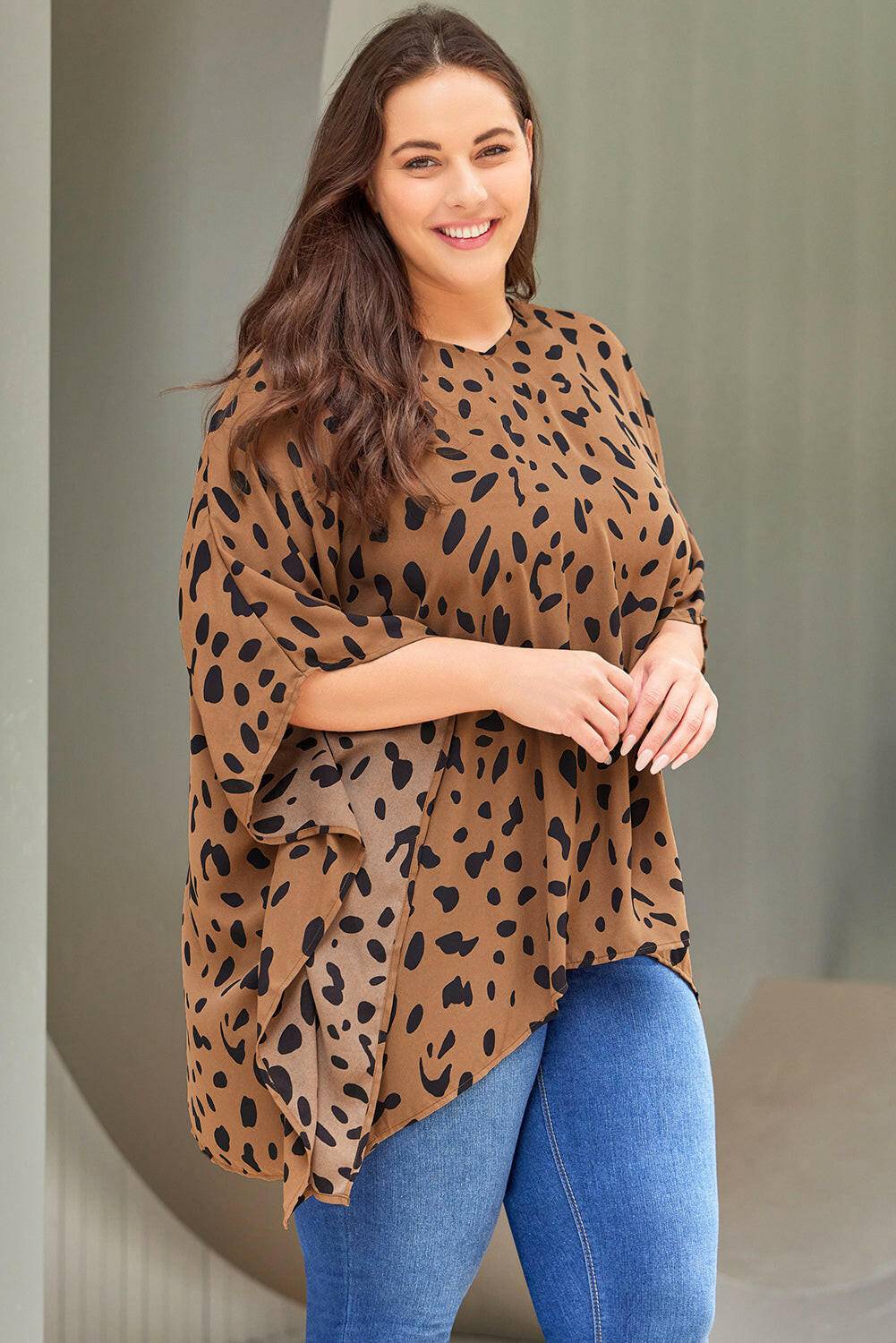 Plus Size Animal Print Handkerchief Hem Blouse.