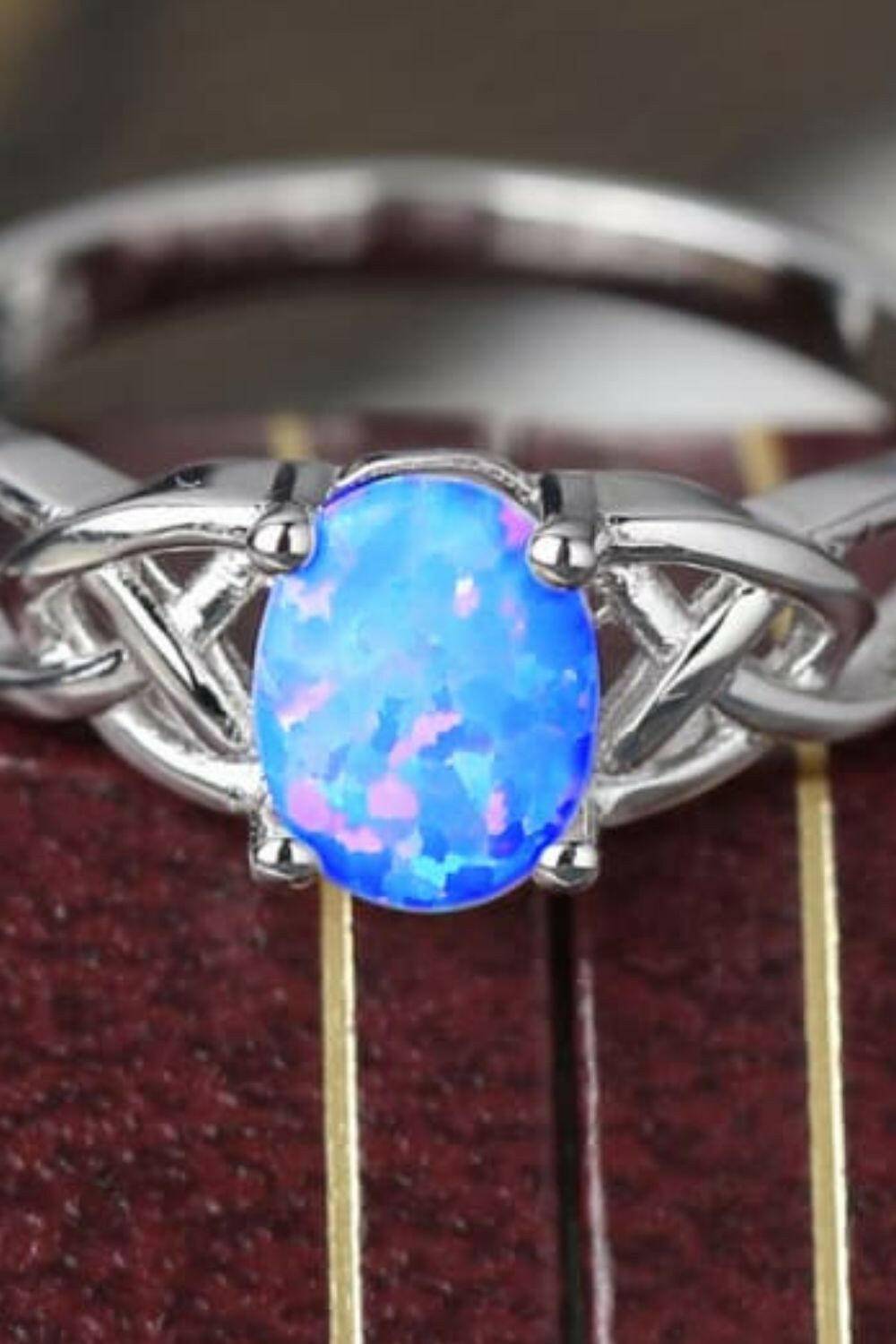 Crisscross 4-Prong Opal Ring.