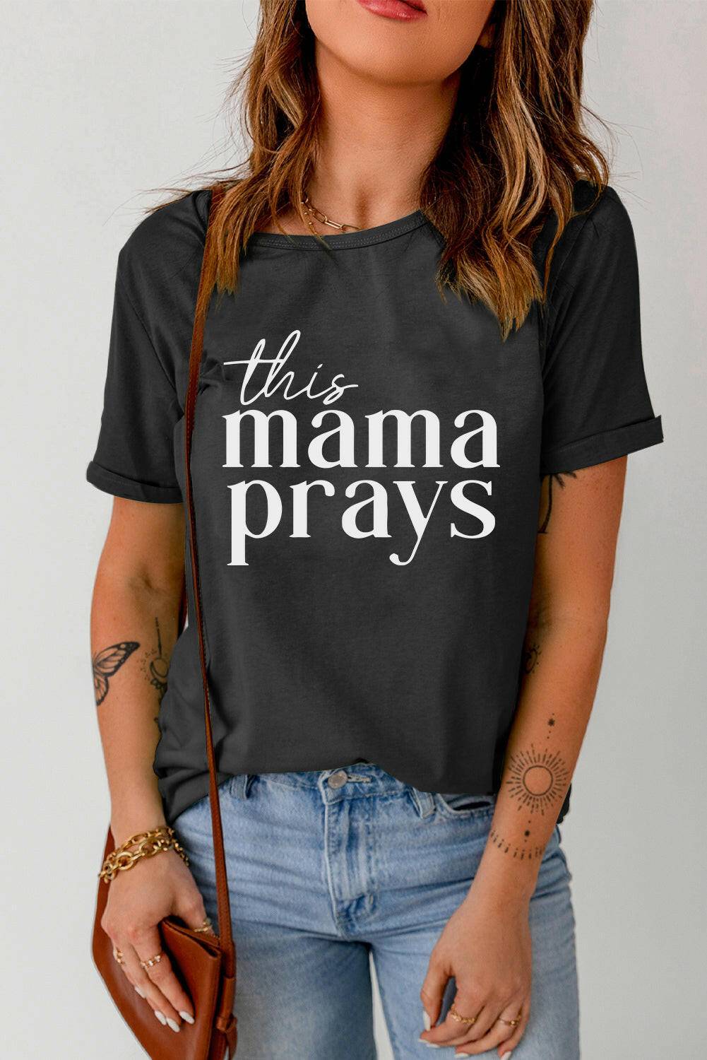 THIS MAMA PRAYS Graphic Tee.