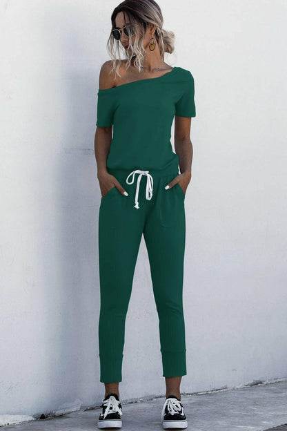 Asymmetrical Neck Tied Jumpsuit with Pockets.