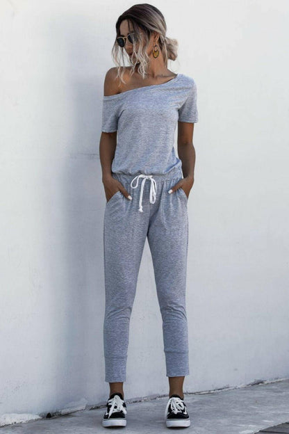 Asymmetrical Neck Tied Jumpsuit with Pockets.