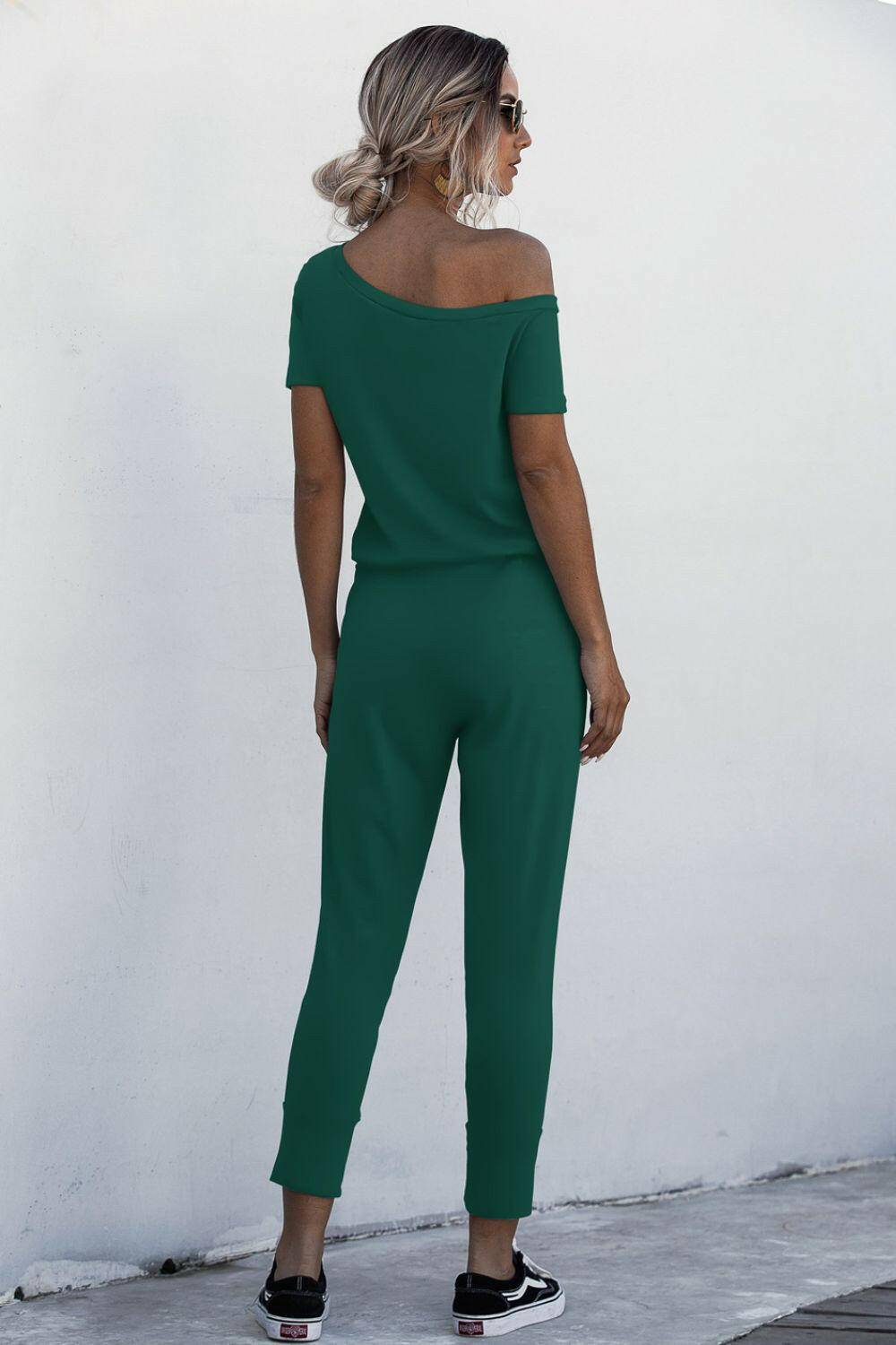 Asymmetrical Neck Tied Jumpsuit with Pockets.