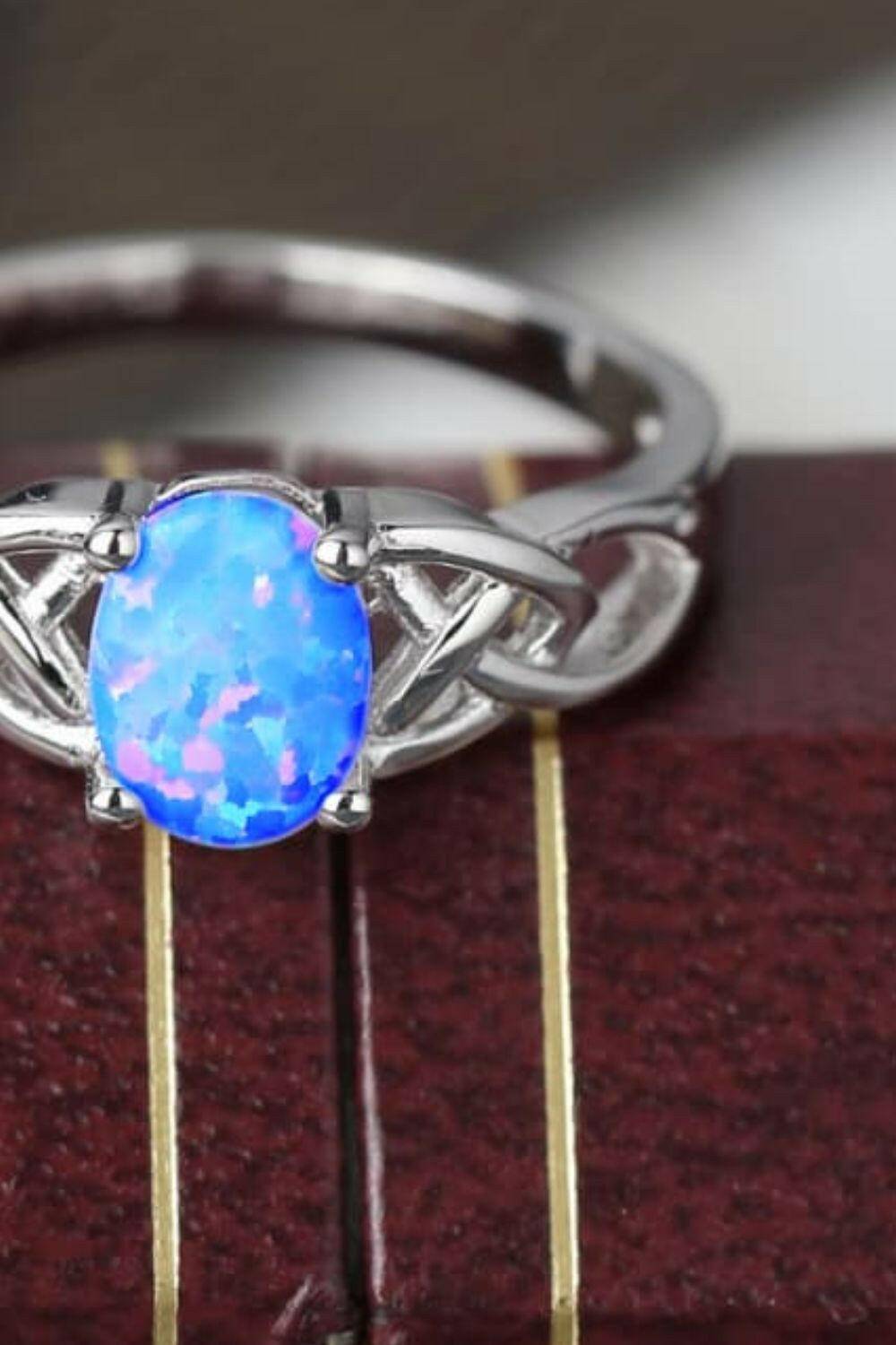 Crisscross 4-Prong Opal Ring.