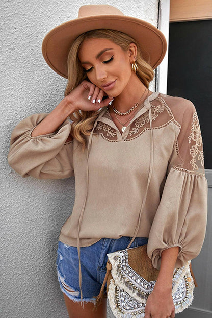 Embroidered Tie-Neck Puff Sleeve Blouse.