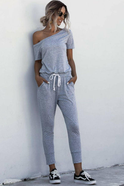 Asymmetrical Neck Tied Jumpsuit with Pockets.