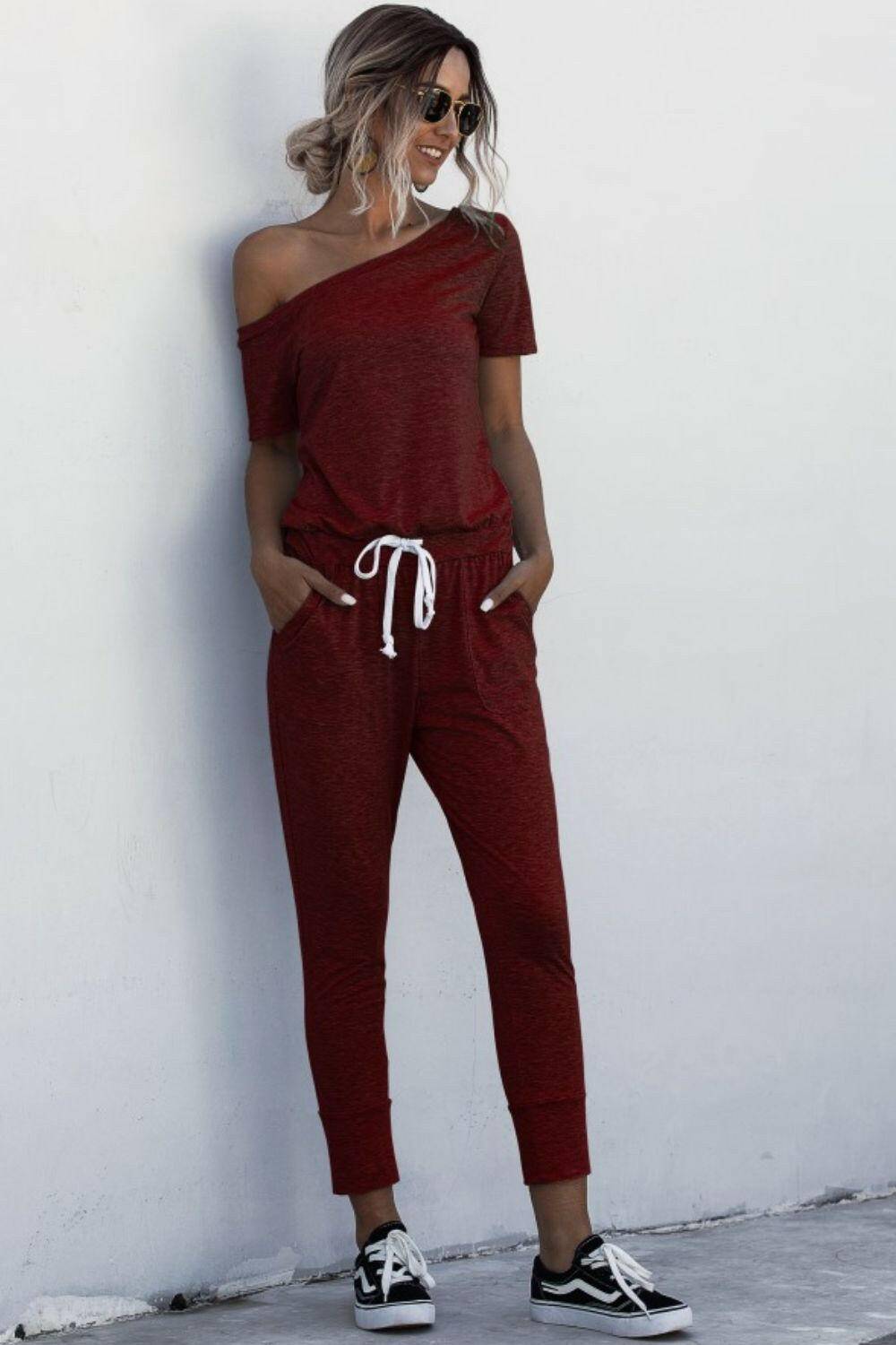 Asymmetrical Neck Tied Jumpsuit with Pockets.