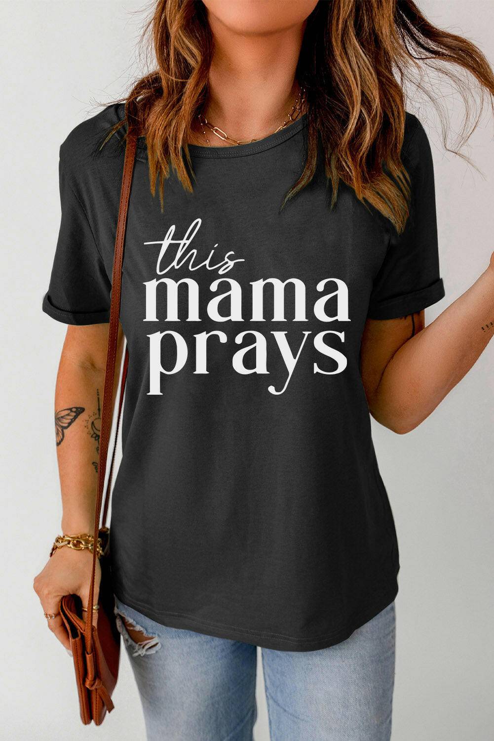 THIS MAMA PRAYS Graphic Tee.