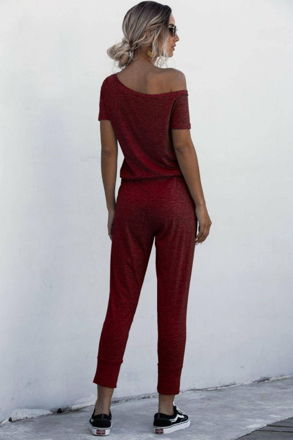 Asymmetrical Neck Tied Jumpsuit with Pockets.